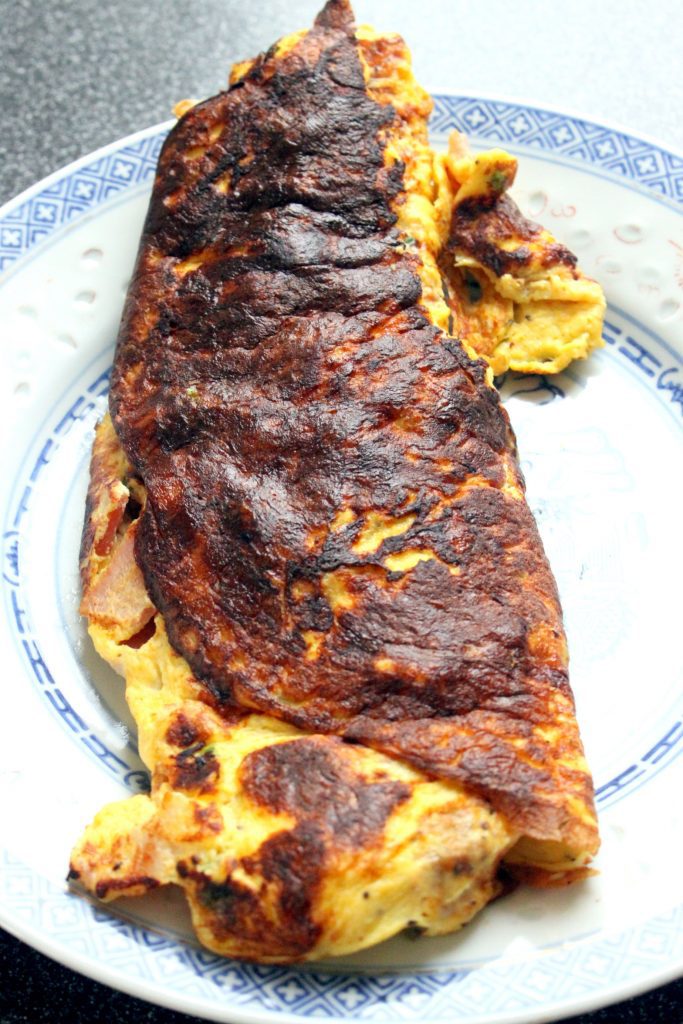 Schnell gemachtes Frühstücks Omelette mit Fuego